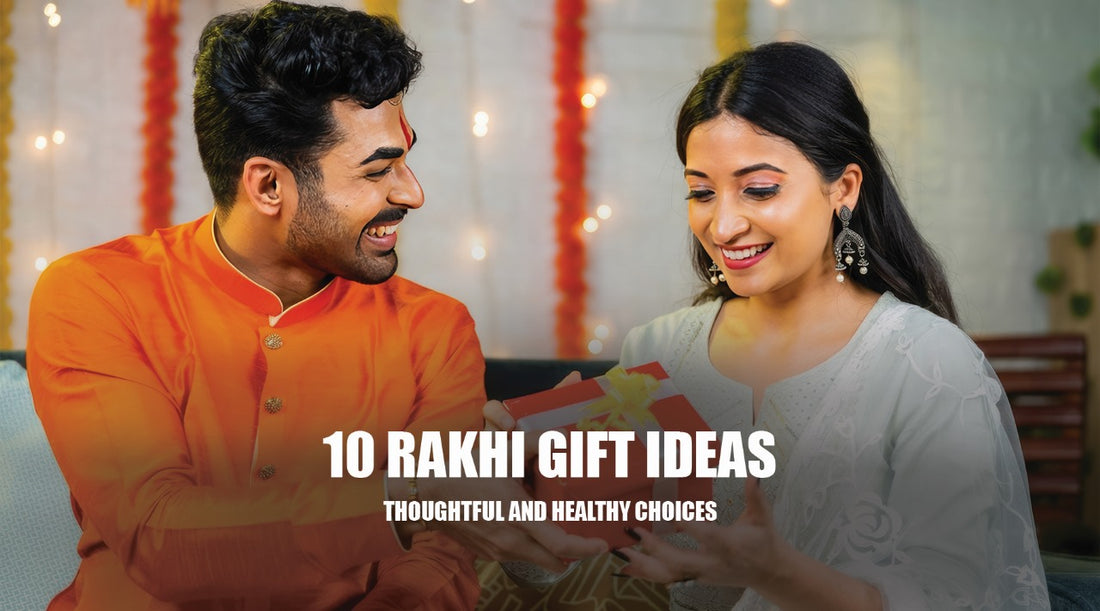 Brother handing over a gift to her sister. Both are dressed in Indian wear