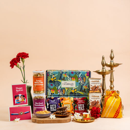 Delightful Bloom and Bliss Rakhi Gift Hamper - 11 Products
