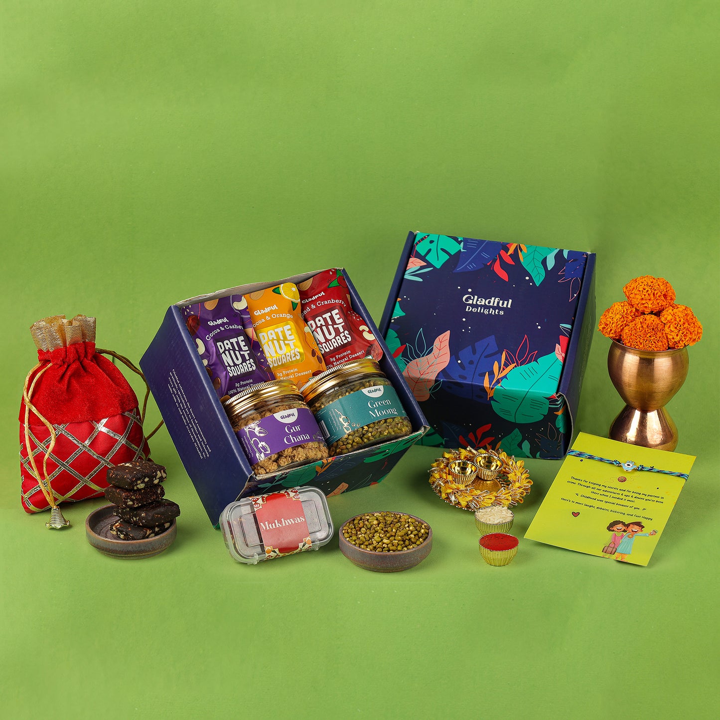 Rakhi Goodies Gift Hamper in Gladful Delights Blue Box - 10 Products